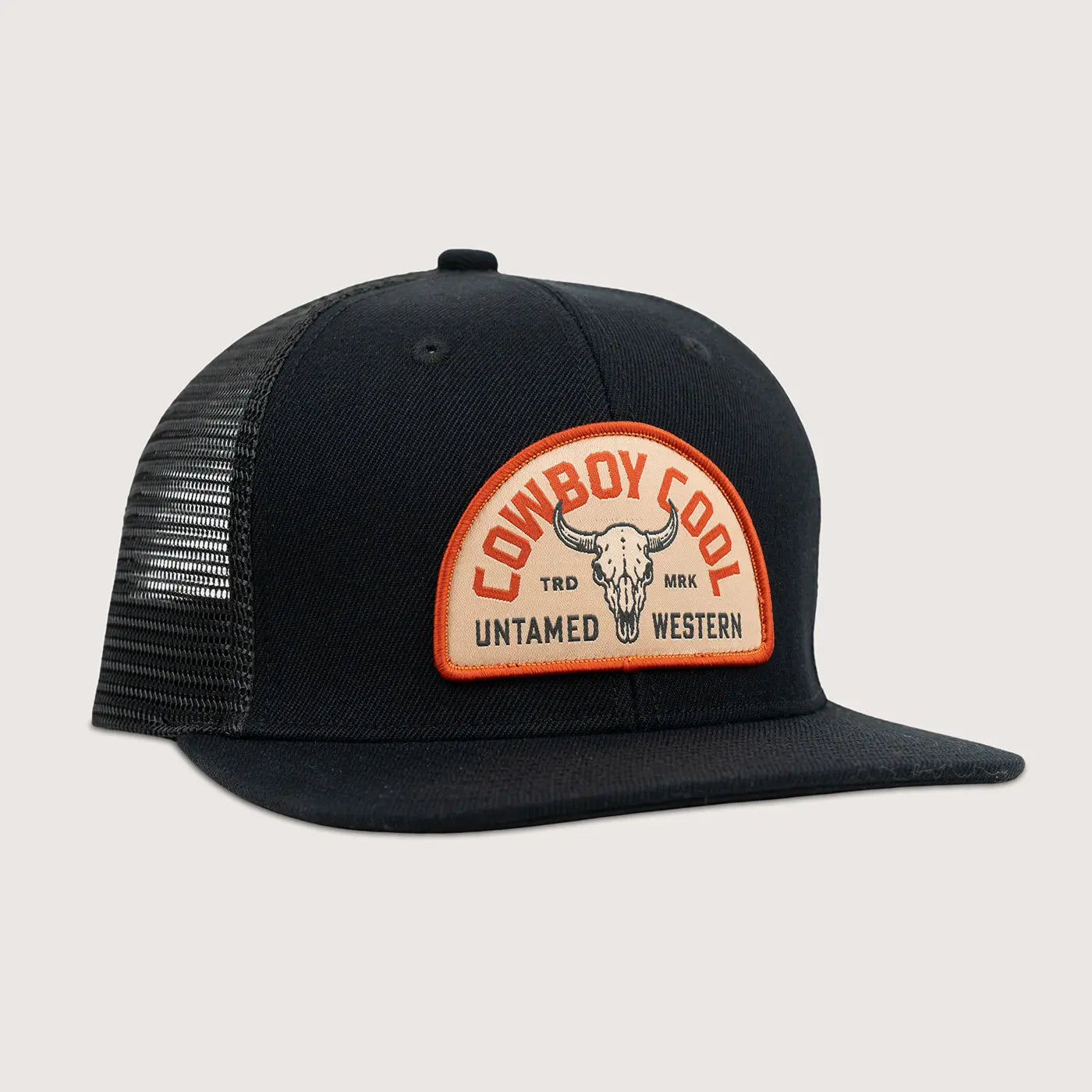 Cowboy Cool Badlands Hat in black with mesh back and bison skull patch featuring Untamed Western branding, snapback trucker design