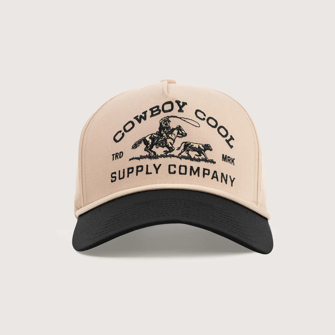Cowboy Cool Roper Hat in tan with black bill featuring embroidered calf roping design and Supply Company branding, built for team ropers