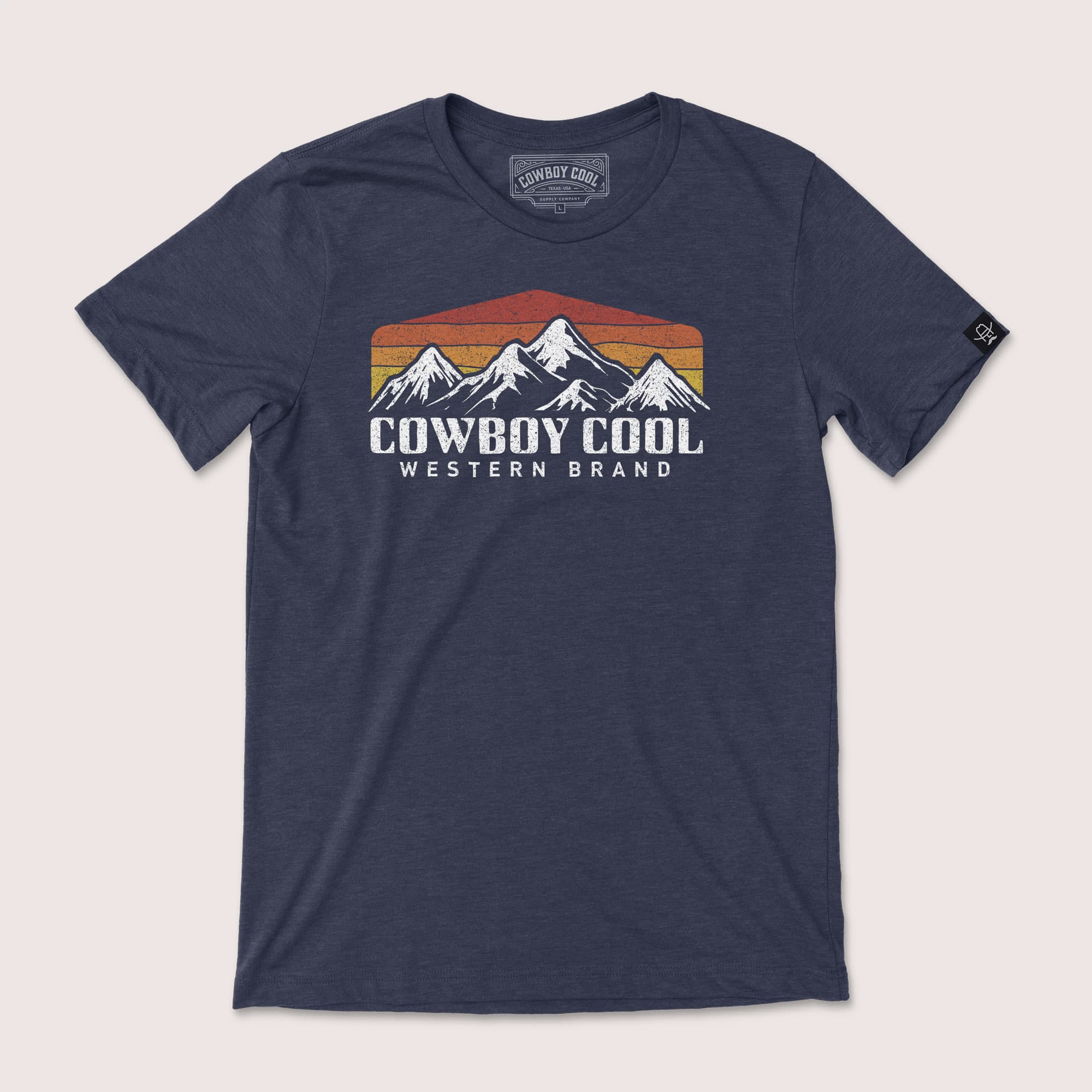 Navy Cowboy Cool High Country T-Shirt with vintage mountains and a retro sunset graphic.