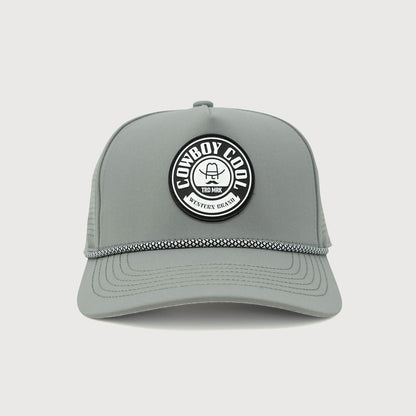 Front view of the gray Cowboy Cool Maverick Hat with a black and white woven rope accent and a round patch featuring the Cowboy Cool logo.