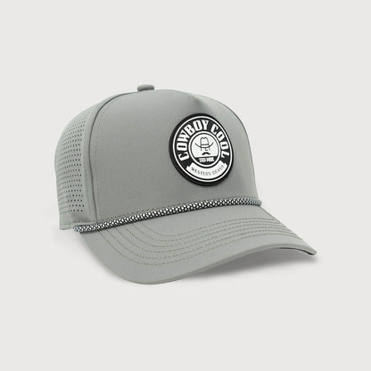 Gray Cowboy Cool Maverick Hat with a black and white woven rope accent, perforated back panels, and a round woven patch featuring the Cowboy Cool logo.