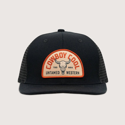 Front view of Cowboy Cool Badlands Hat in black with mesh back and bison skull patch featuring Untamed Western branding, snapback trucker design