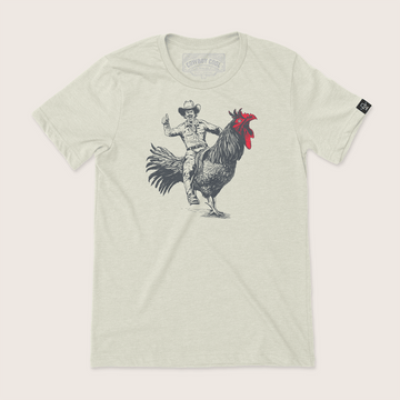 Cowboy Cool Rooster Round Up T-Shirt featuring a cowboy riding a rooster. 