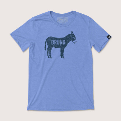 Cowboy Cool Drunk A$$ T-Shirt in heather Carolina blue, featuring a distressed navy donkey graphic with the word 'DRUNK' printed across the body.