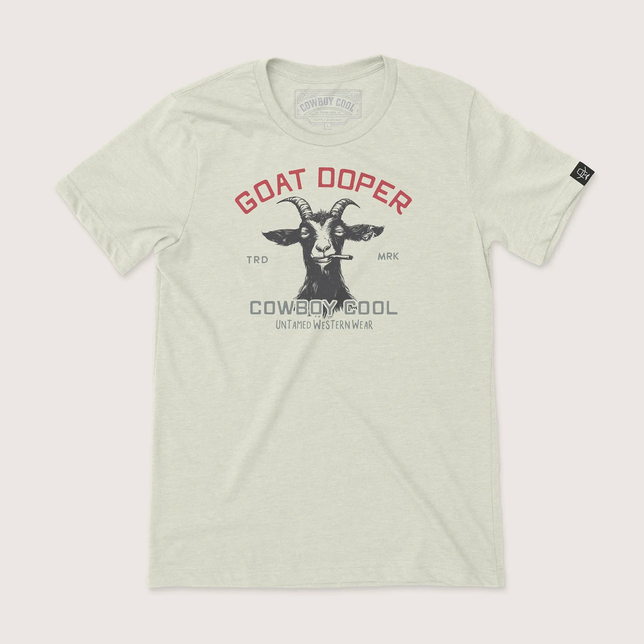 Goat Doper Western Wear T-Shirt by Cowboy Cool in heather oatmeal, featuring a rebellious goat with a cigar and bold 'Goat Doper' text above 'Untamed Western Wear' branding.