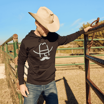 Man wearing a Cowboy Cool Hank Hoodie in Black.