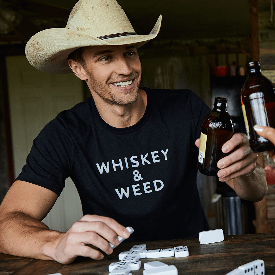 Male cowboy model wearing a Cowboy Reserve T-Shirt